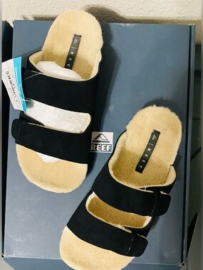 Reef Raven Black Slide Sandals with Tan Footbed